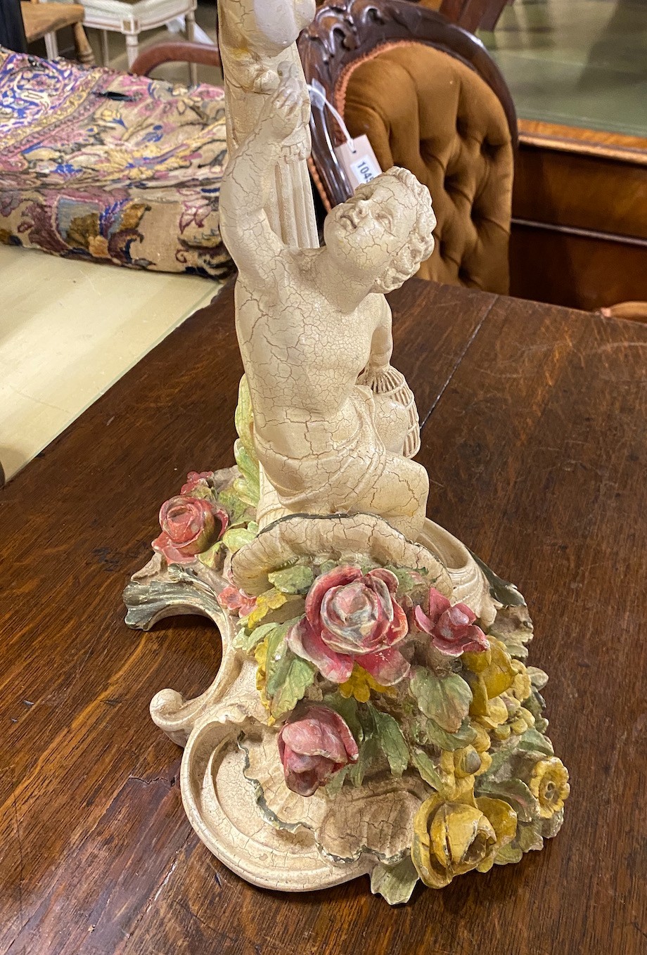 A 1950's Italian composite occasional table with figural cornucopia stem, width 49cm, depth 35cm, height 50cm